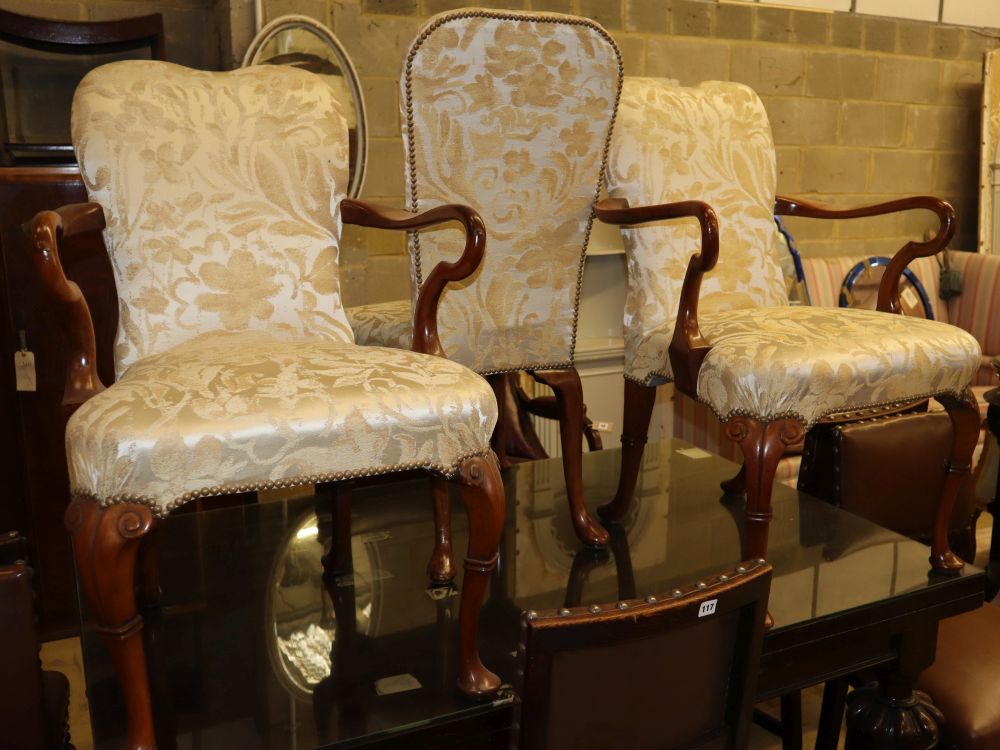 A pair and a single George I style walnut shepherds crook armchairs